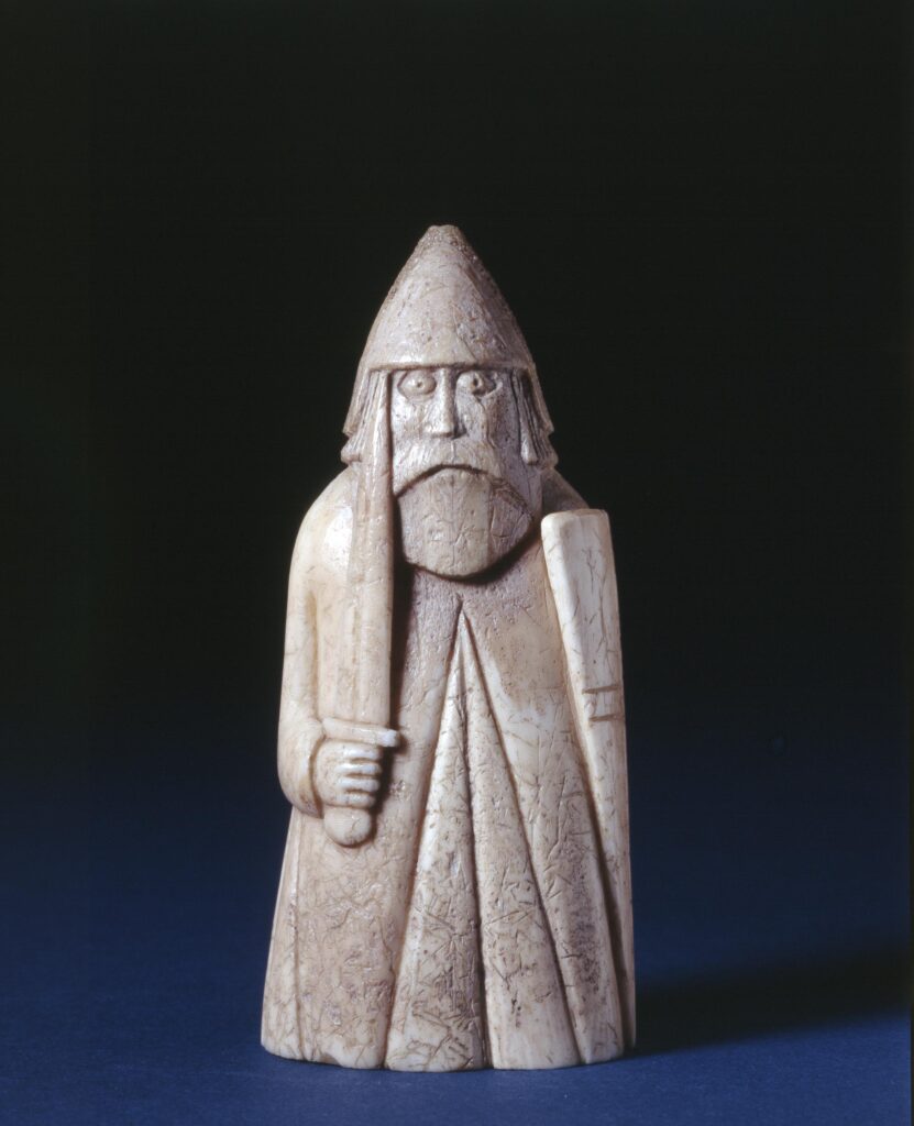Chess piece; warder holding sword and shield