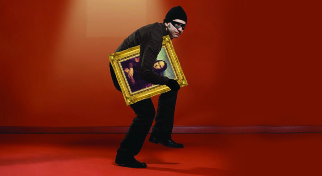 This photograph shows a burglar creeping away with the Mona Lisa, a painting that was frequently stolen in the past.