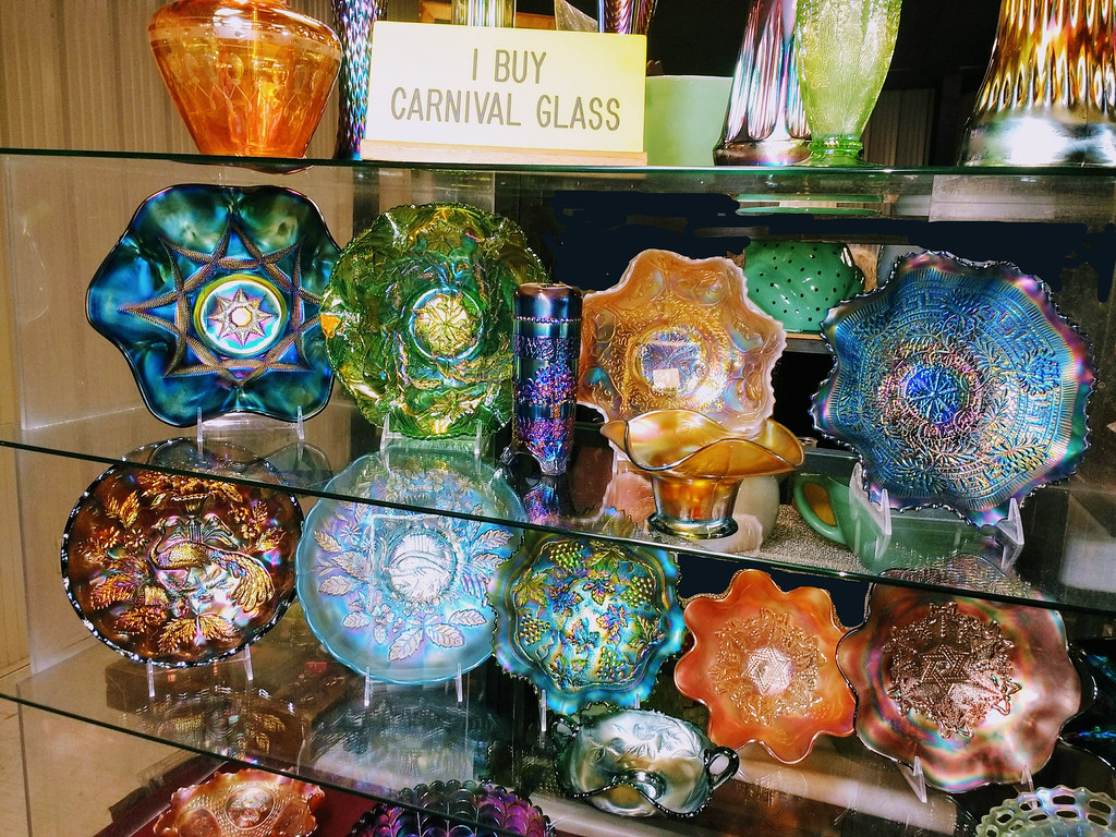 Carnival glass pieces at the Houston Vintage Glass Show & Sale in Rosenberg, Texas. Photographed by Flickr user, PINKE on February 15, 2020 with a Motorola Moto G camera. 